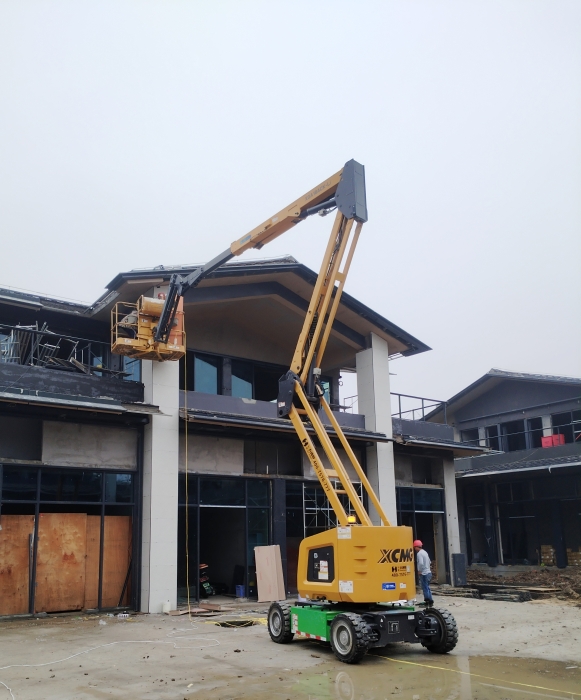 绿色建造新标杆！PG电子平台锂电高机助力鄂州民生工程